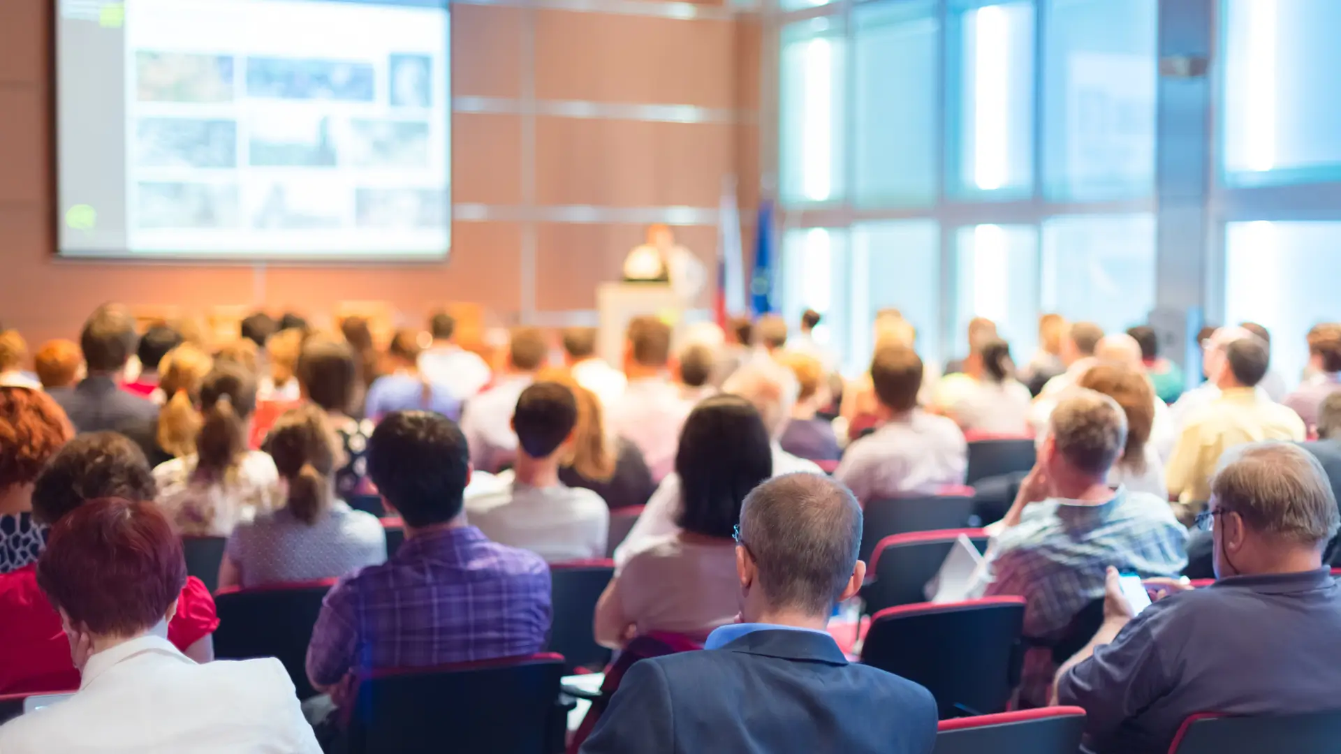 Show the audience confidence at a massive event from a presentation talk